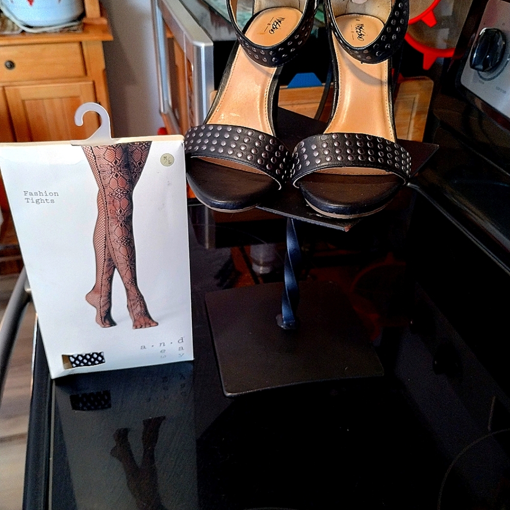 Women's Studded Heels W/Fish Net Stockings.